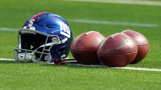 Dec 12, 2021; Inglewood, California, USA; A detailed view of a New York Giants helmet and Wilson official NFL Due footballs at SoFi Stadium.