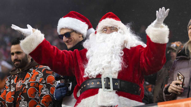 A fan dressed as Santa Claus at a Cleveland Browns game