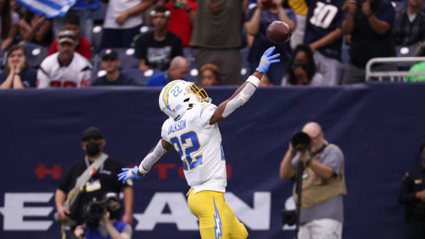 Dec 26, 2021; Houston, Texas, USA; Los Angeles Chargers running back Justin Jackson (22) scores a touchdown during the second quarter against the Houston Texans at NRG Stadium. Mandatory Credit: Troy Taormina-USA TODAY Sports