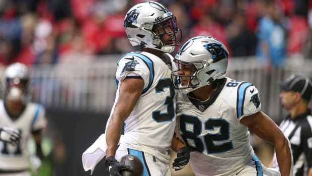 Oct 31, 2021; Atlanta, Georgia, USA; Carolina Panthers running back Chuba Hubbard (30) celebrates after a touchdown with tight end Tommy Tremble (82) against the Atlanta Falcons in the second half at Mercedes-Benz Stadium. Mandatory Credit: Brett Davis-USA TODAY Sports