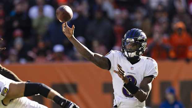 Dec 12, 2021; Cleveland, Ohio, USA; Baltimore Ravens quarterback Lamar Jackson (8) throws the ball against the Cleveland Browns during the first quarter at FirstEnergy Stadium. Mandatory Credit: Scott Galvin-USA TODAY Sports