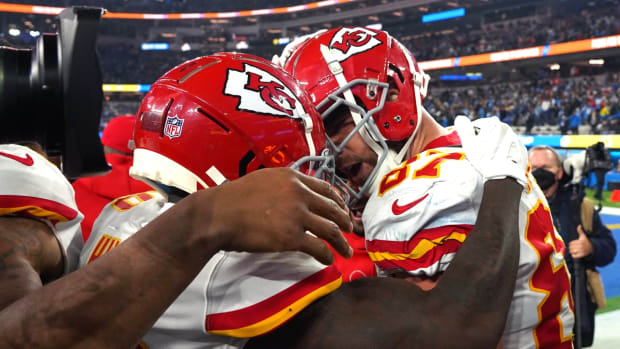 Dec 16, 2021; Inglewood, California, USA; Kansas City Chiefs tight end Travis Kelce (87) celebrates with wide receiver Tyreek Hill (10) after scoring a touchdown in overtime against the Los Angeles Chargers at SoFi Stadium. Mandatory Credit: Kirby Lee-USA TODAY Sports