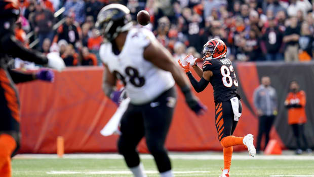 Cincinnati Bengals wide receiver Tyler Boyd (83) catches a touchdown pass in the second quarter during a Week 16 NFL game against the Baltimore Ravens, Sunday, Dec. 26, 2021, at Paul Brown Stadium in Cincinnati.

Baltimore Ravens At Cincinnati Bengals Dec 26