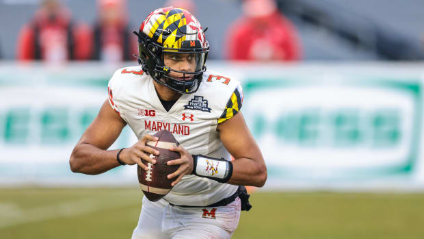 Dec 29, 2021; New York, NY, USA; Maryland Terrapins quarterback Taulia Tagovailoa (3) rolls out in the first half during the 2021 Pinstripe Bowl against the Virginia Tech Hokies at Yankee Stadium. Mandatory Credit: Vincent Carchietta-USA TODAY Sports