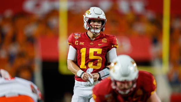 Dec 29, 2021; Orlando, Florida, USA; (15)***Iowa State Cyclones quarterback Brock Purdy (15) calls an audible at the line of scrimmage in the first half against the Clemson Tigers at Camping World Stadium.