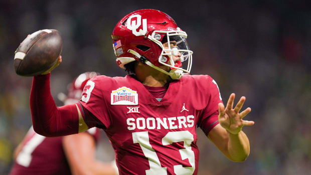 Caleb Williams passes during the Alamo Bowl