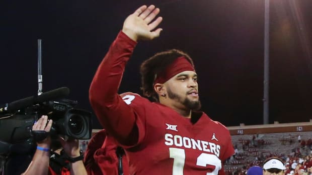 Oklahoma Sooners quarterback Caleb Williams (13) waves to fans after the game against the TCU Horned Frogs at Gaylord Family-Oklahoma Memorial Stadium.