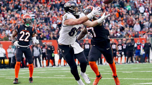 Baltimore Ravens tight end Mark Andrews (89) catches a touchdown pass as Cincinnati Bengals linebacker Germaine Pratt (57) defends in the third quarter during a Week 16 NFL game, Sunday, Dec. 26, 2021, at Paul Brown Stadium in Cincinnati. The Cincinnati Bengals defeated the Baltimore Ravens, 41-21.

Baltimore Ravens At Cincinnati Bengals Dec 26