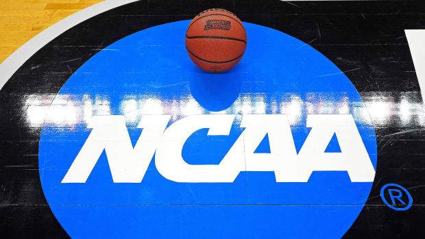 NCAA logo with a basketball