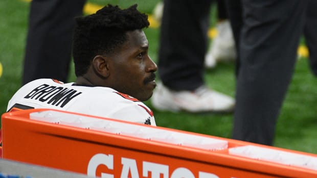 Antonio Brown sits on the Buccaneers bench.