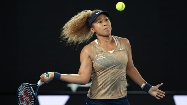 Naomi Osaka of Japan plays a forehand during the singles match against Andrea Petkovic of Germany, at Summer Set tennis tournament ahead of the Australian Open in Melbourne, Australia, Friday, Jan. 7, 2022.
