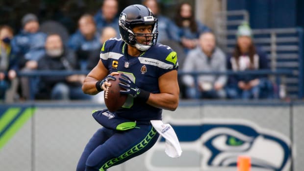 Russell Wilson throws a pass for Seattle.