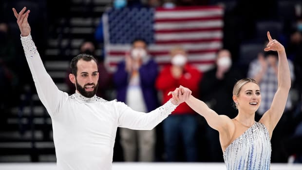 Ashley Cain-Gribble (right) and Timothy LeDuc (left) react after skating in the Championship Pairs Short Program event during the U.S. Figure Skating Championships at Bridgestone Arena in Nashville, Tenn., Thursday, Jan. 6, 2022. They finished first in the event.