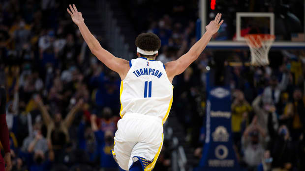 Golden State Warriors guard Klay Thompson (11) celebrates his 1800th career three-point basket