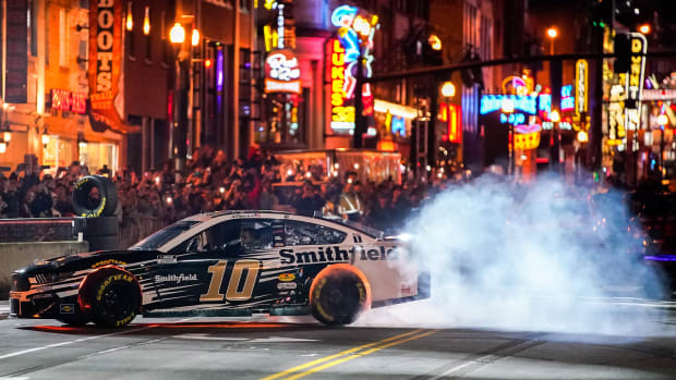 Aric Almirola drives during the NASCAR Burnouts on Broadway event on Lower Broadway in Nashville, Tenn., Wednesday, Dec. 1, 2021.