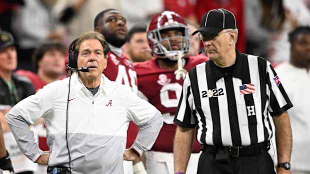 Jan 10, 2022; Indianapolis, IN, USA; Alabama Crimson Tide head coach Nick Saban watches a replay against the Georgia Bulldogs in the fourth quarter during the 2022 CFP college football national championship game at Lucas Oil Stadium.