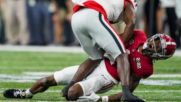 Jameson Williams injures his knee in the national championship.
