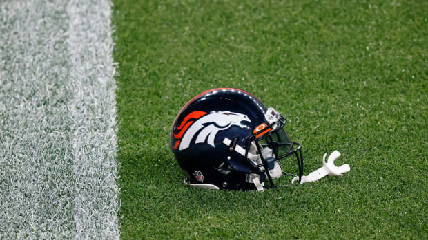 Sep 14, 2020; Denver, Colorado, USA; A Denver Broncos helmet on the ground before the game against the Tennessee Titans at Empower Field at Mile High.