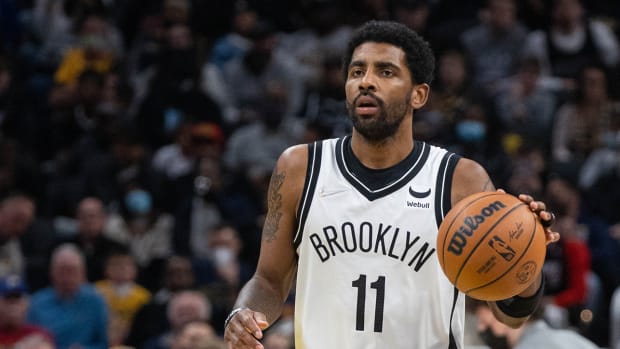 Kyrie Irving playing for the Nets.