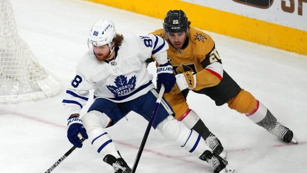 Jan 11, 2022; Las Vegas, Nevada, USA; Toronto Maple Leafs right wing William Nylander (88) skates ahead of Vegas Golden Knights center Chandler Stephenson (20) during an overtime period at T-Mobile Arena. Mandatory Credit: Stephen R. Sylvanie-USA TODAY Sports