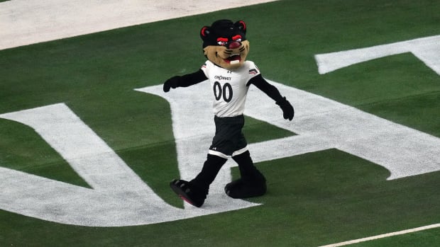 The Cincinnati Bearcats mascot walks through the end zone during a timeout in the third quarter during the College Football Playoff semifinal game against the Alabama Crimson Tide at the 86th Cotton Bowl Classic, Friday, Dec. 31, 2021, at AT&T Stadium in Arlington, Texas. The Alabama Crimson Tide defeated the Cincinnati Bearcats, 27-6.