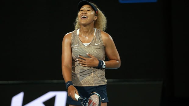 Naomi Osaka of Japan reacts, during the singles match against Andrea Petkovic of Germany, at Summer Set tennis tournament ahead of the Australian Open in Melbourne, Australia, Friday, Jan. 7, 2022.