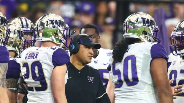 Ikaika Malloe has gone from the UW to UCLA. Would he consider becoming the Hawaii coach.