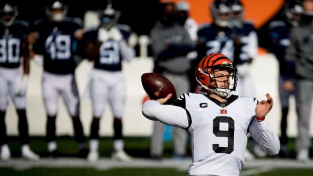 Cincinnati Bengals quarterback Joe Burrow (9) throws a pass in the second quarter of the NFL game between Cincinnati Bengals and Tennessee Titans on Sunday, Nov. 1, 2020, in Cincinnati.