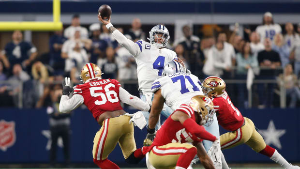 Dallas Cowboys quarterback Dak Prescott (4) throws a pass in the fourth quarter against the San Francisco 49ers in a NFC Wild Card playoff football game at AT&T Stadium.