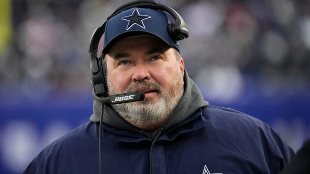 Mike McCarthy coaching the Cowboys.