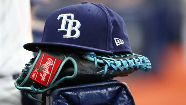A Rays hat and glove.