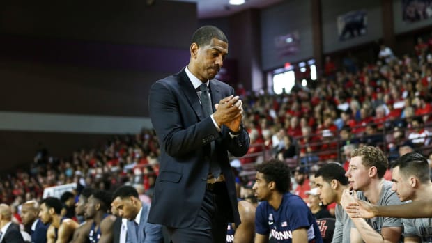 Mar 4, 2018; Houston, TX, USA; Connecticut Huskies head coach Kevin Ollie reacts after a play during the second half against the Houston Cougars at Health and Physical Education Arena.