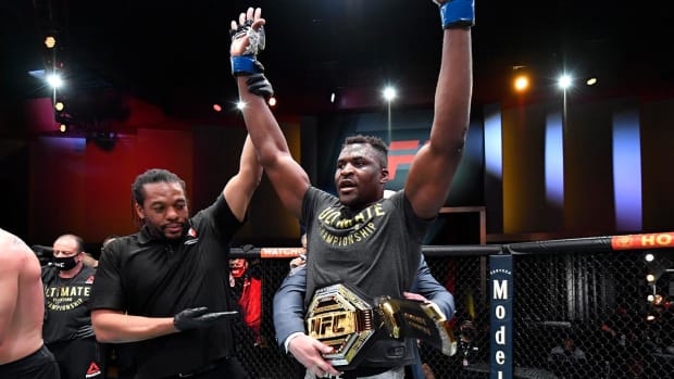 Mar 27, 2021; Las Vegas, NV, USA; Francis Ngannou of Cameroon reacts after his victory over Stipe Miocic in their UFC heavyweight championship fight during the UFC 260 event at UFC APEX on March 27, 2021 in Las Vegas, Nevada.