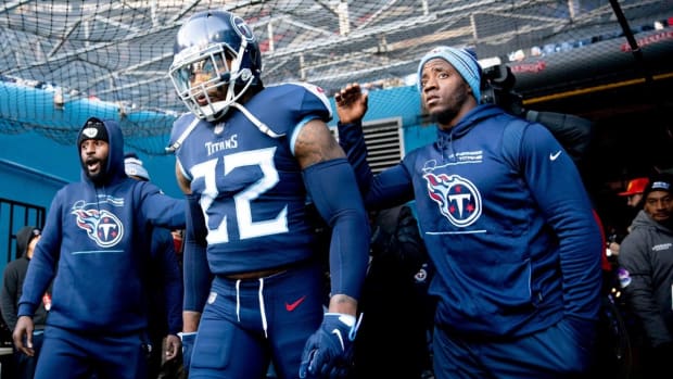 Tennessee Titans running back Derrick Henry (22) steps on to the field to face the Bengals during the AFC Divisional playoff game at Nissan Stadium Saturday, Jan. 22, 2022 in Nashville, Tenn.