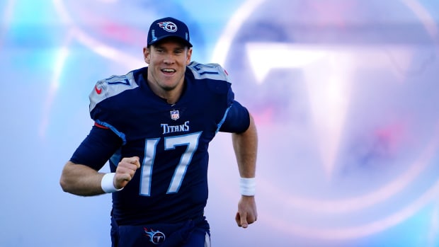 Tennessee Titans quarterback Ryan Tannehill (17) is introduced before NFL divisional playoff football game against the Cincinnati Bengals, Saturday, Jan. 22, 2022, at Nissan Stadium in Nashville.