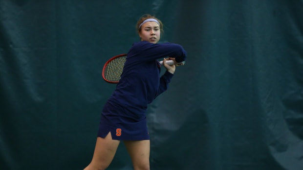 Polina Kozyreva hits a return