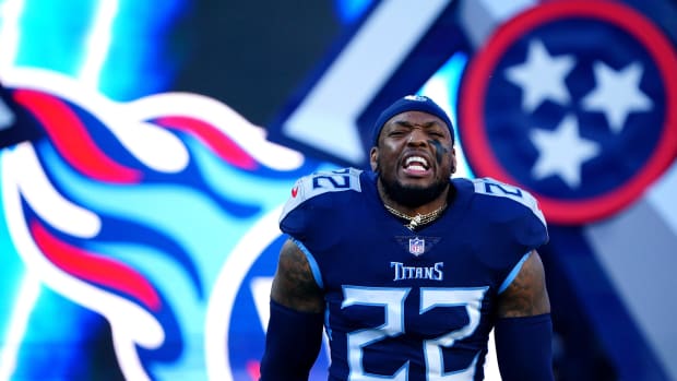 Tennessee Titans running back Derrick Henry (22) is introduced before NFL divisional playoff football game against the Cincinnati Bengals, Saturday, Jan. 22, 2022, at Nissan Stadium in Nashville.