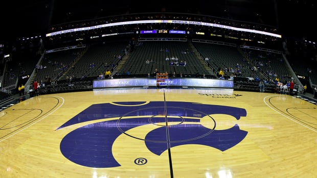 Kansas State logo on a basketball court.