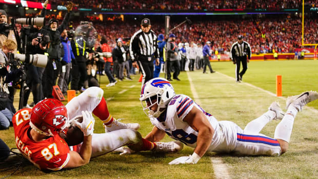 Kansas City Chiefs tight end Travis Kelce (87) scores the game winning touchdown against the Buffalo Bills during overtime in the AFC Divisional playoff football game