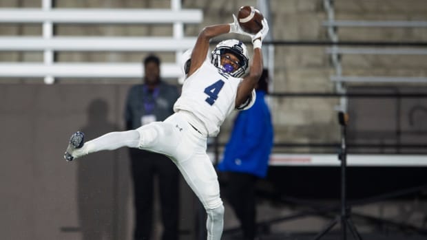 Clay-Chalkville's Mario Craver (4) catches a pass for a two-point conversion during the Class 6A football state championship at Protective Stadium in Birmingham, Ala., on Friday, Dec. 3, 2021.