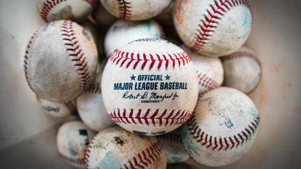 A bucket of baseballs.