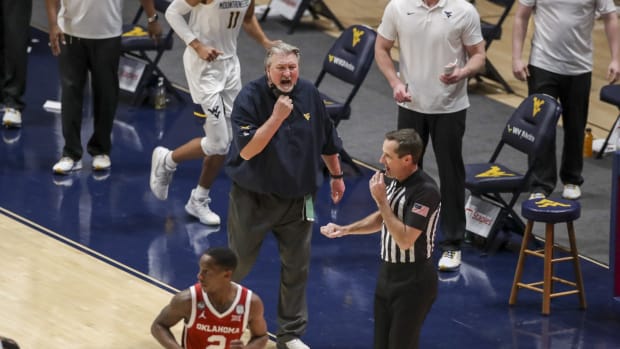 West Virginia Mountaineers head coach Bob Huggins argues a call during the second half against the Oklahoma Sooners at WVU Coliseum.