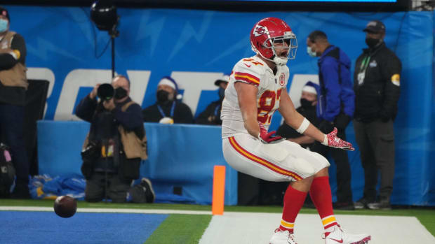 Dec 16, 2021; Inglewood, California, USA; Kansas City Chiefs tight end Travis Kelce (87) celebrates after scoring a touchdown in overtime against the Los Angeles Chargers at SoFi Stadium. Mandatory Credit: Kirby Lee-USA TODAY Sports