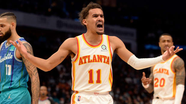 Atlanta Hawks guard Trae Young (11) reacts after being called on a foul during the second half against the Charlotte Hornets.