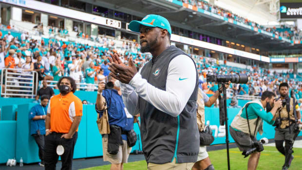 Miami Dolphins head coach Brian Flores, walks off the field after defeating the New York Jets during NFL game at Hard Rock Stadium Sunday in Miami Gardens.