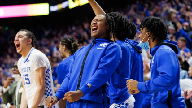 Jan 25, 2022; Lexington, Kentucky, USA; Kentucky Wildcats guard TyTy Washington Jr. celebrates from the bench during the second half against the Mississippi State Bulldogs at Rupp Arena at Central Bank Center. Mandatory Credit: Jordan Prather-USA TODAY Sports