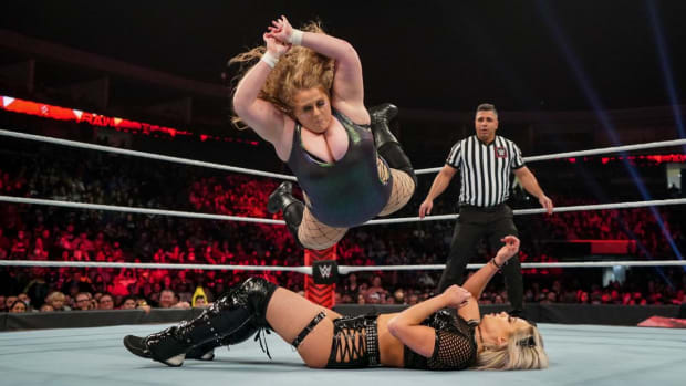 WWE's Doudrop hits a frog splash on Liv Morgan