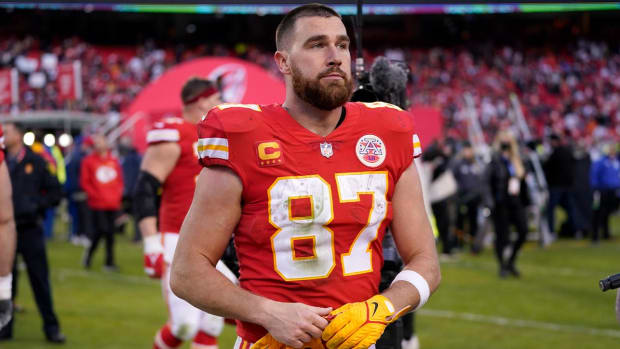 Kansas City Chiefs tight end Travis Kelce walks off the field after the AFC championship NFL football game against the Cincinnati Bengals, Sunday, Jan. 30, 2022, in Kansas City, Mo. The Bengals won 27-24 in overtime