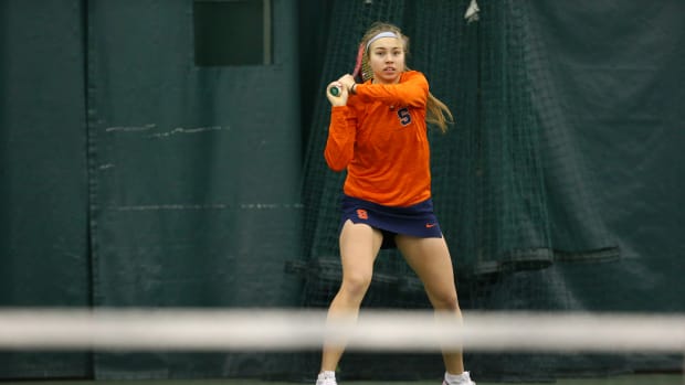 Polina Kozyreva hits a backhand for Syracuse women's tennis