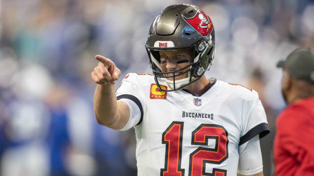 Tom Brady points while playing for the Buccaneers